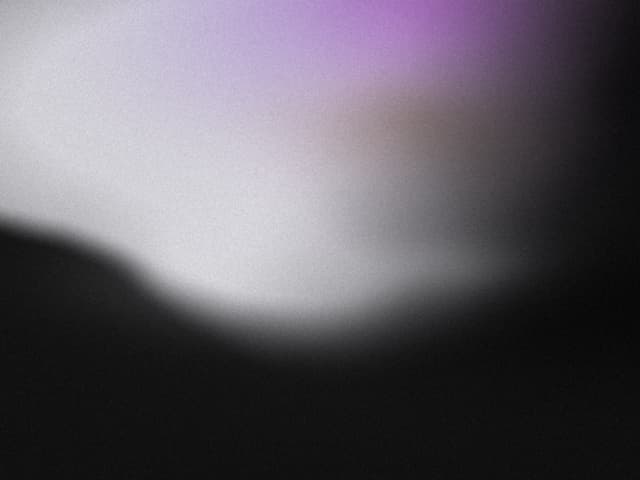 Grainy Light Leak Shader Background — Grain component for React & Tailwind by Kedhareswer Naidu